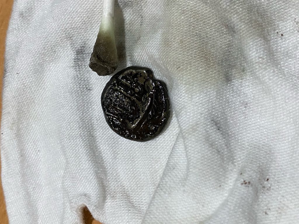 Detailed coin cleaning