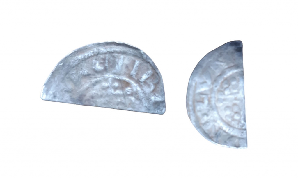 voided short cross penny
