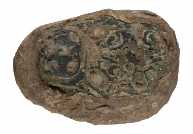 Viking weight with oval brooch
